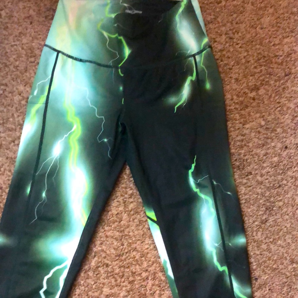 Feed me fight me lightning leggings.
